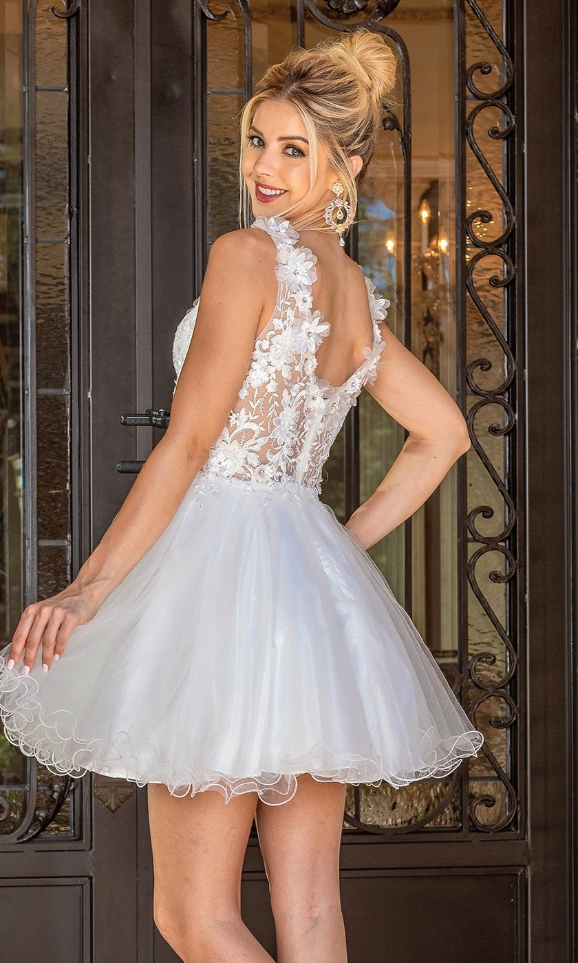 A woman models the Flower-Bodice Sleeveless Short Hoco Dress 3297, featuring floral lace details. She stands in front of a decorative door, looking over her shoulder and smiling. Ideal as a party dress for under $100.